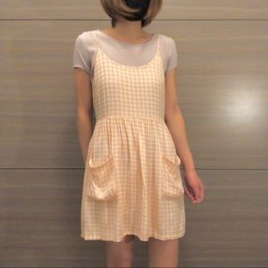 Forever 21 gingham pink and white dress with pockets.  Size medium.  Sleeveless.